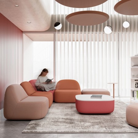 Fauteuils lounge modulaires Jelly dans un espace d’accueil professionnel à Lausanne.