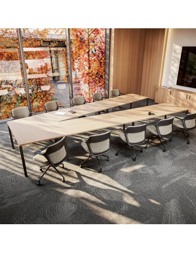 Table de réunion moderne en V 10 places dans une salle de conférence à Genève